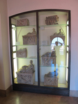 Display case with funerary urns thumbnail