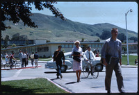 Students walking at the corner of Pepper Lane and Poly Vue Drive thumbnail