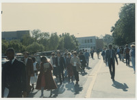 [Group marching on University Drive] thumbnail