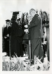 [President McPhee and Harold Wilson shake graduate's hand] thumbnail