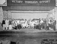 Students posing onstage thumbnail