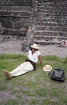 Michele Serros sitting on the grass in Teotihuacan Mexico thumbnail