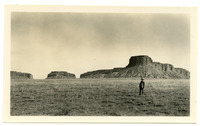 [Man standing in front of buttes] thumbnail
