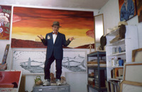 Alfredo de Batuc with Paintings in Artist's Studio thumbnail