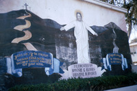 Dedication Mural Depicting Jesus and Mount Calvary in Estrada Courts thumbnail