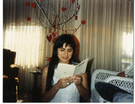 Michele Serros reading a card thumbnail