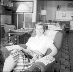 Unknown woman sitting in a parlor thumbnail