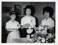 Yteens serving tea and cookies thumbnail