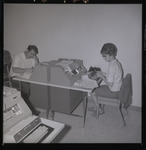 [Student type on card punch machines] thumbnail