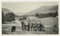 [Group crowds around tractor] thumbnail