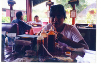 Michele Serros eating barbeque thumbnail