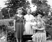 Three women with a child thumbnail