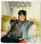 Michele Serros showing off a new shirt thumbnail