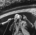 Student speaking in front of microphones thumbnail