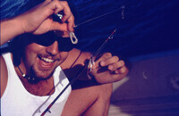 R.J. Smith catching a crab thumbnail