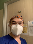 Photograph of Nurse Cuong Phu Pham in Front of Door thumbnail