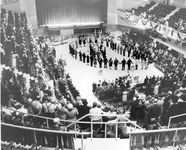 People gathered in an assembly hall at Grange convention thumbnail