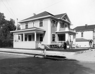 Family in front of house thumbnail