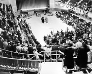 People gathered in an assembly hall at Grange convention thumbnail