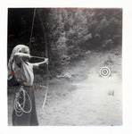 Girl practicing archery thumbnail
