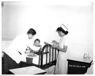 Baby examination. thumbnail
