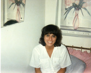 Michele sitting indoors thumbnail