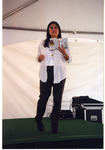 Michele Serros reading Chicana Falsa on stage thumbnail