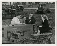 Poly Royal Queen Gerry Cox and Three Men on John Deere Farm Equipment thumbnail