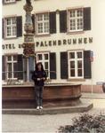 A band member of The Fuzztones standing outside of a hotel thumbnail