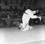 Two men compete in a judo match. thumbnail