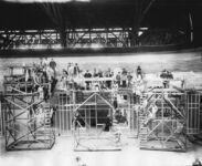 Workmen of scaffolding in front of Lincoln Highway exhibit thumbnail