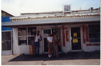 Michele Serros outside of a local butcher shop thumbnail