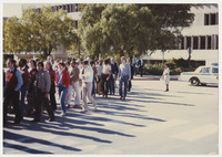 [Group marching in front of Robert E. Kennedy Library] thumbnail