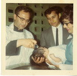 Baptism picture Michele Serros with godparents thumbnail