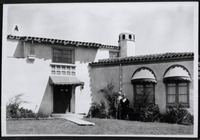 President Benjamin Crandall and Matilda Crandall standing in front of the recently completed President's House [copy negative] thumbnail
