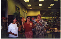 Michele Serros and friends holding chicharrónes thumbnail