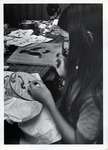 Girl working on an embroidery project thumbnail