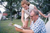 John and Elaine Steinbeck in the yard of the Sag Harbor house. thumbnail