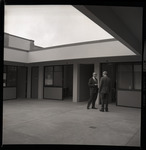 [Two men in Building 14 office courtyard] thumbnail