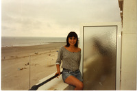 Michele sitting on a balcony thumbnail