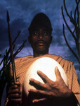 Antandroy tribesman holding fossilized egg of extinct elephant bird thumbnail