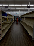 Darya Likhareva Photograph of Empty Store Shelves thumbnail