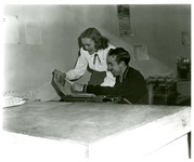 Students with newspaper thumbnail