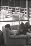 [Reading the newspaper at Kennedy Library] thumbnail