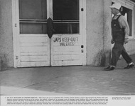 [Barbershop in Parker, Arizona, with sign ""Japs Keep Out You Rats""] thumbnail