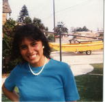 Michele standing in front yard thumbnail