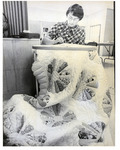 Margaret Plagmann working on a section of a quilt thumbnail