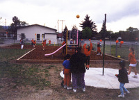 Children playing at a playground thumbnail