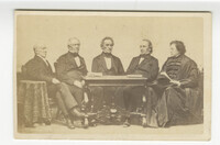 Photo of five men sitting around a table (location unknown) thumbnail
