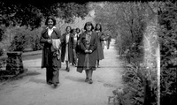 Group of teenage girls walking down a dirt road thumbnail